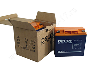 Открытая коробка и аккумулятор Delta GX 12-17 рядом